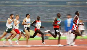 Athletes compete in the men's first round 800m heat