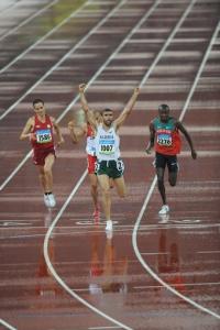 Algeria's Nabil Madi (front) celebrates as he crosses the