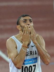 Algeria's Nabil Madi celebrates winning the men's 800m semifinal