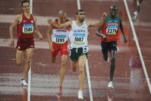 Algeria's Nabil Madi (front) celebrates as he crosses the