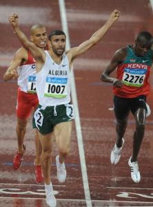 Algeria's Nabil Madi (C) celebrates as he crosses the