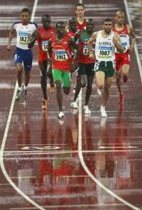 Algeria's Nabil Madi, second right, leads Sudan's Abubaker Kaki,