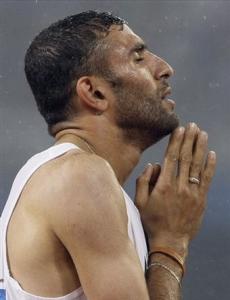 Algeria's Nabil Madi reacts after winning a semifinal of