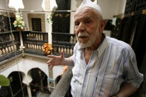 Moulidj Hajd Zubir, 75, talks to Reuters in a