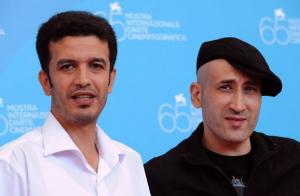 Algeria's director Tariq Teguia (R) poses with Algeria's actor