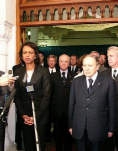 U.S. Secretary of State Condoleezza Rice, left, briefs the