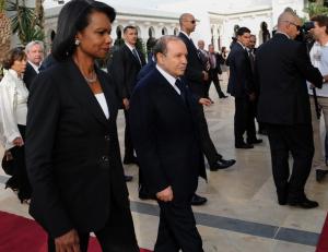 US Secretary of State Condoleezza Rice (L) walks with