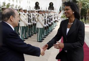 Algeria's President Abdelaziz Bouteflika shakes hands with U.S. Secretary