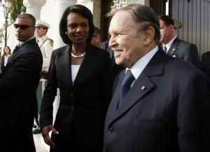 Algeria's President Abdelaziz Bouteflika (R) talks to U.S. Secretary