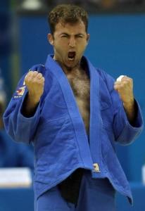 Mouloud Noura of Algeria celebrates his victory over Makoto