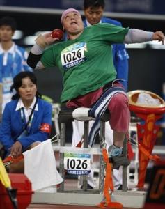 Algeria's Nadia Medjemedj prepares to throws a shot put