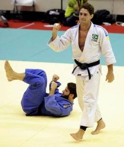 Brazil's Flavio Canto (R) reacts after his win over