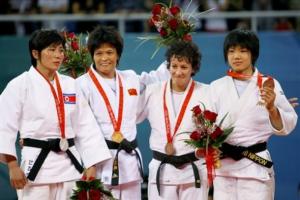 From left to right, silver medalist An Kum Ae