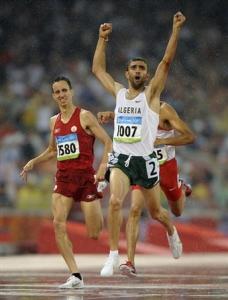 Algeria's Nabil Madi, right, celebrates in a semifinal of