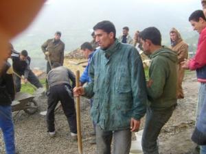 عمل تطوعي لأشغال ذات منفعة عامة بقرية 