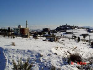 صورة لقرية  بني العالم  تحت الثلوج (ولاية برج بوعريريج)