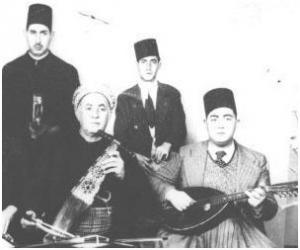 صورة للفنان الجزائري  العربي بن صاري  و ولديه  أحمد  و  رضوان