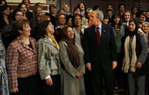 President Bush is pictured during a group photo with