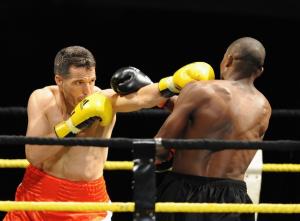 Ivory Coast's (R) Didier Mebara fights with Algeria's Brahim