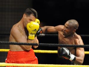 Ivory Coast's (R) Didier Mebara fights with Algeria's Brahim