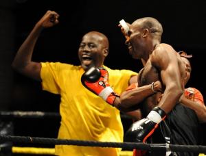 Ivory Coast's (R) Didier Mebara celebrates after defeating Algeria's
