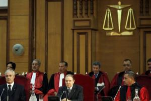 Algeria's President  Abdelaziz Boutfelika (C) gives a speech