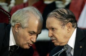 Algeria's President Abdelaziz Bouteflika (R) talks to Justice Minister
