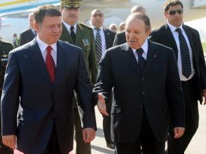 Algerian President Abdelazziz Bouteflika (R) and  Jordanian King