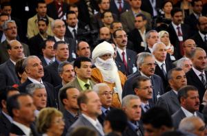 Algerian deputies attend a meeting of the Parliament and
