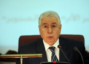 Algerian National Council President Abdelkader Bensaleh adresses a special