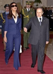 Argentine President Cristina Fernandez, left, is welcomed by Algerian
