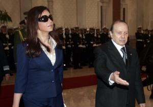 Algeria's President Abdelaziz Bouteflika (R) welcomes Argentina's President Cristina