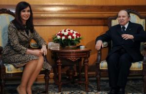 Algerian President Abdelazziz Bouteflika (R) gestures beside his Argentinian