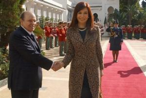 Algerian President Abdelaziz Bouteflika, left, greets Argentine President Cristina
