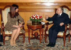 Algerian President Abdelaziz Bouteflika, right, talks with Argentine President