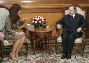 Algeria's President Abdelaziz Bouteflika (R) speaks with his Argentina