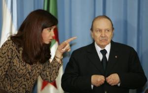 Algeria's President Abdelazziz Bouteflika (R) chats with his Argentinian