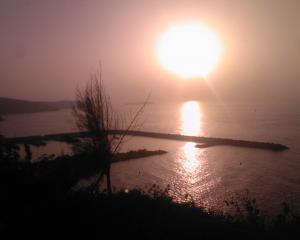 غروب الشمس على شاطئ  بني صاف